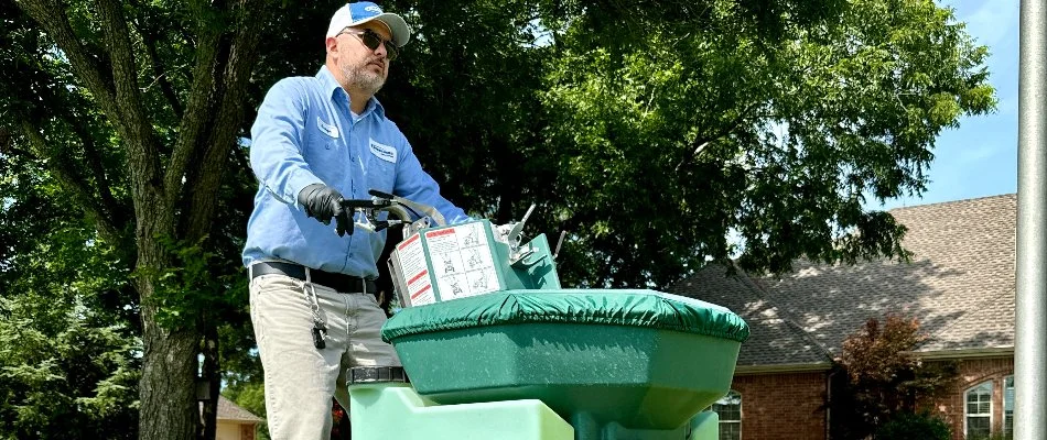 Lawn fertilization treatment being applied to a lawn in Dallas, TX.